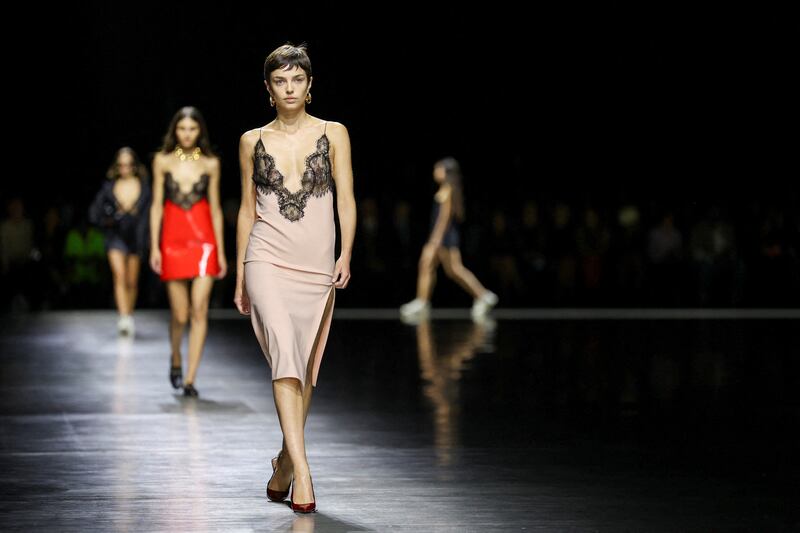 Models in lingerie-slip dresses at Gucci spring/summer 2024. Reuters