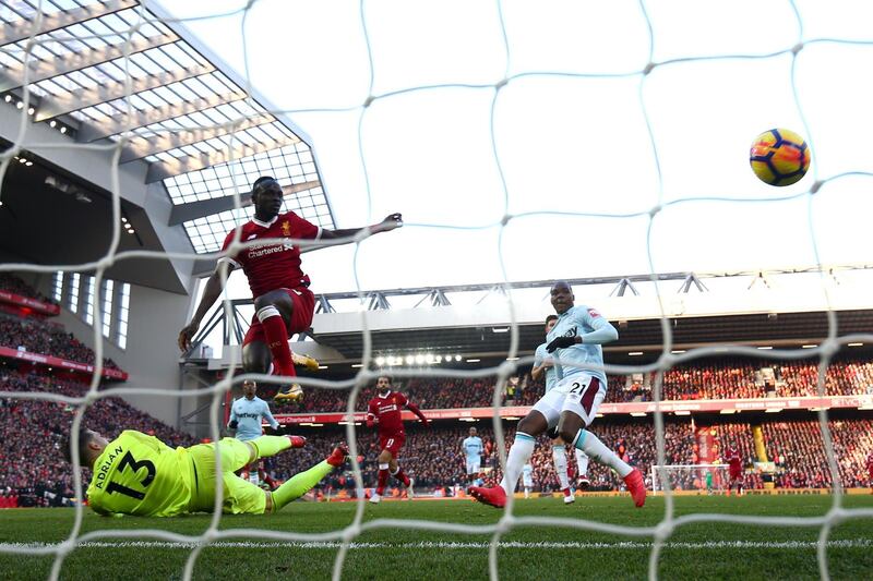 LIVERPOOL, ENGLAND - FEBRUARY 24:  Sadio Mane of Liverpool scores his side's fourth goal during the Premier League match between Liverpool and West Ham United at Anfield on February 24, 2018 in Liverpool, England.  (Photo by Clive Brunskill/Getty Images)