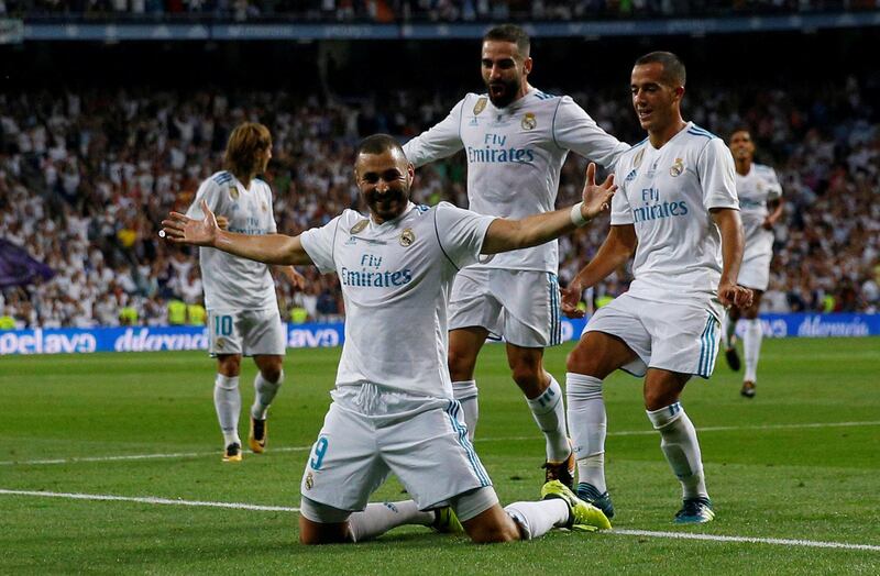 Soccer Football - Real Madrid vs Barcelona - Spanish Super Cup Second Leg - Madrid, Spain - August 16, 2017   Real Madrid’s Karim Benzema celebrates scoring their second goal with team mates    REUTERS/Juan Medina     TPX IMAGES OF THE DAY