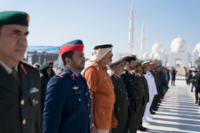 ABU DHABI, UNITED ARAB EMIRATES - November 30, 2017: Members of the UAE Armed Forces observe a moment of silence during a Commemoration Day flag raising ceremony at Wahat Al Karama, a memorial dedicated to the memory of UAE’s National Heroes in honour of their sacrifice and in recognition of their heroism.
( Hamad Al Kaabi / Crown Prince Court - Abu Dhabi )
---