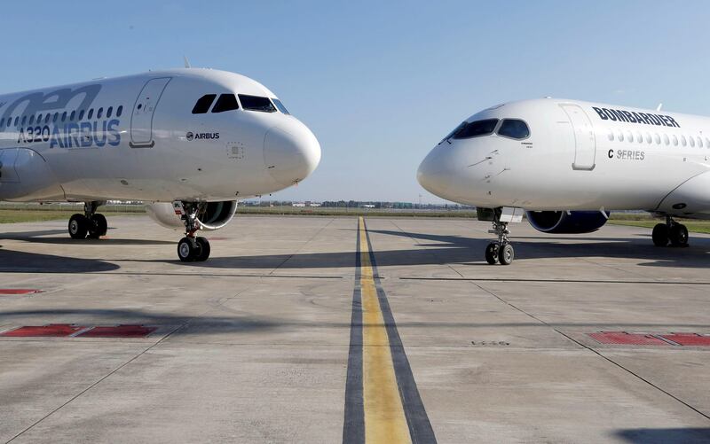 FILE PHOTO: An Airbus A320neo aircraft and a Bombardier CSeries aircraft are pictured during a news conference to announce a partnership between Airbus and Bombardier on the C Series aircraft programme, in Colomiers near Toulouse, France, October 17, 2017.   REUTERS/Regis Duvignau/File Photo