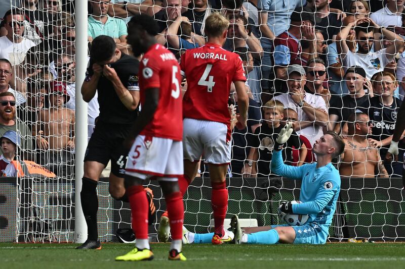 Forest goalkeeper Dean Henderson saves a penalty from West Ham's Declan Rice. AFP