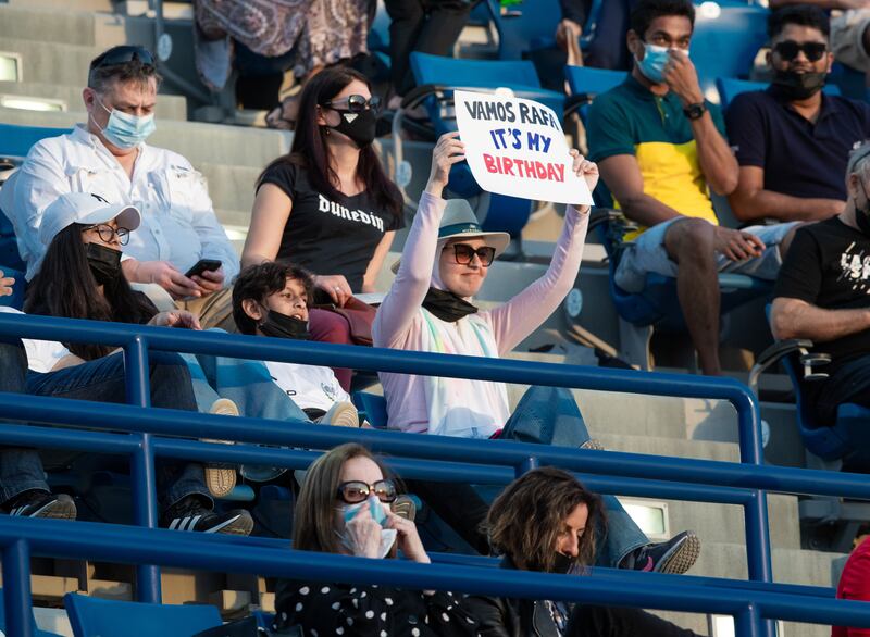 A fan displays a sign for Rafael Nadal at the Mubadala World Tennis Championship. Victor Besa / The National