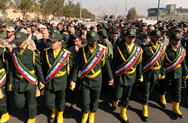 Members of the Iranian Revolutionary Guard carry the casket of Iran's Revolutionary Guards Brigadier General Mohsen Ghajarian, who was killed in the northern province of Aleppo by jihadists in Syria, during their funeral procession in the capital Tehran, on February 6, 2016. 
Brigadier General Mohsen Ghajarian of the elite Revolutionary Guards was killed in the northern province of Aleppo, according to the Fars news agency, which is close to the Guards. He was advising pro-government forces in the fight against the Islamic State (IS) jihadist group, it reported, without saying when he died.

 / AFP PHOTO / ATTA KENARE