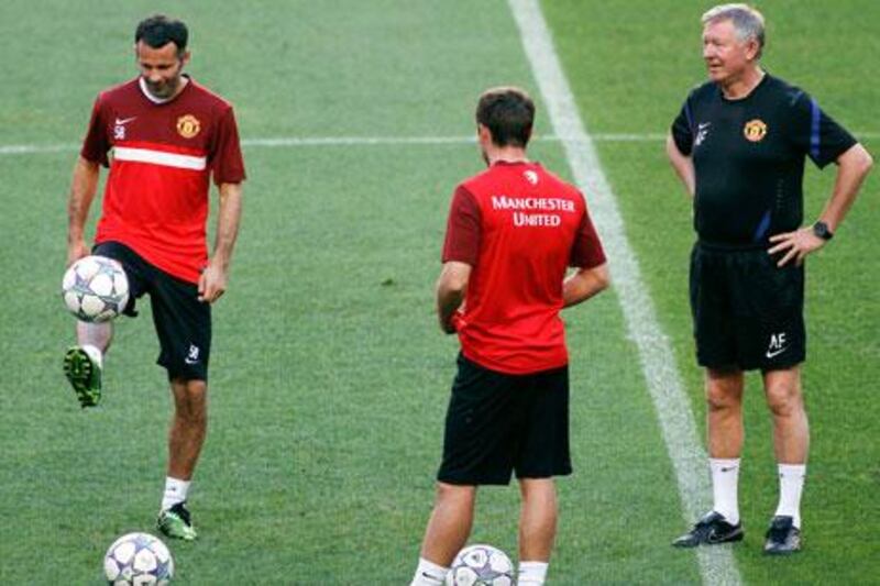 Manager Sir Alex Ferguson, right, and midfielder Ryan Giggs, left, have had long and successful careers at Manchester United.