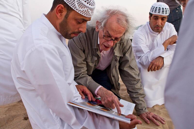 MADINAT ZAYED, UNITED ARAB EMIRATES,  October 10, 2012. Christo Yavacheff (center), a Bulgarian born instalation artistsnow living in New York, meets with Liwa residents Khalfan Al Qubasi (L) and Saeed Al Falahi (R) to discuss his plans to construct in Liwa a pyramid of 415,000 oil drums that will be bigger than the main pyramid of giza. (ANTONIE ROBERTSON / The National)