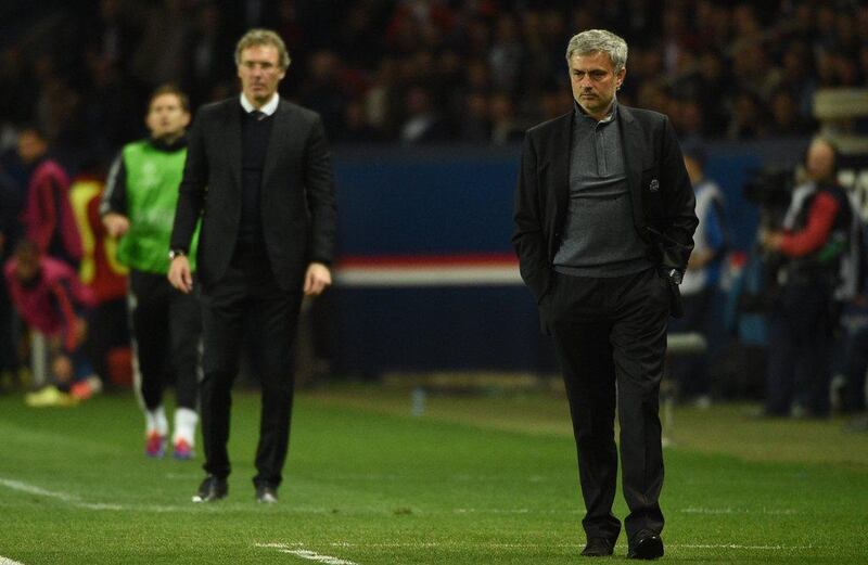 Chelsea manager Jose Mourinho, right, during Wednesday night's Champions League loss to Paris Saint-Germain. Martin Bureau / AFP / April 2, 2014     

