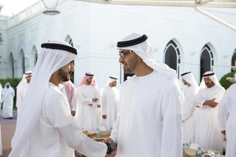 Sheikh Mohammed bin Zayed, Crown Prince of Abu Dhabi and Deputy Supreme Commander of the Armed Forces, greets an Armed Forces servicemen injured while serving the armed forces in Yemen. Seen during a Sea Palace barza. Ryan Carter / Crown Prince Court - Abu Dhabi