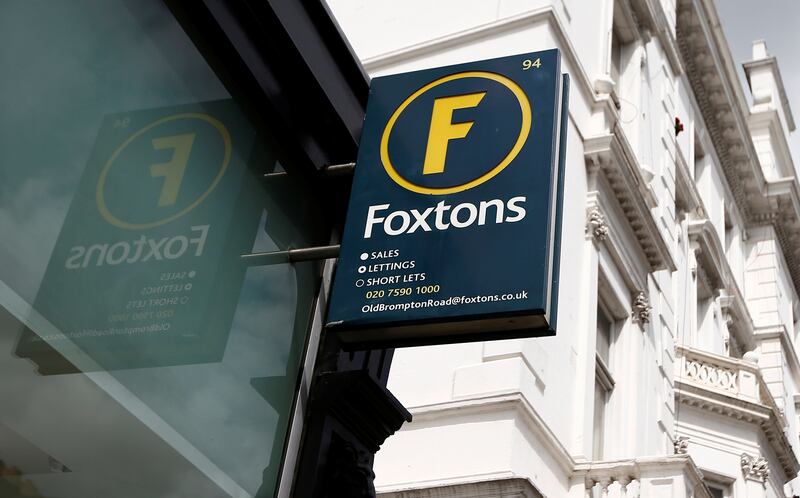 A Foxtons estate agent sign outside a branch in London. UAE investor Jassim Alseddiqi has acquired 2 per cent of the company. Reuters