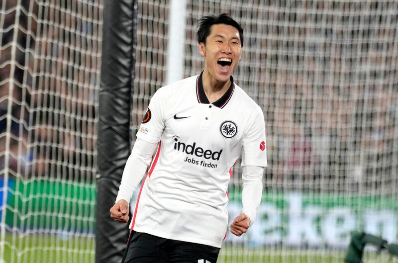 Daichi Kamada celebrates after scoring. AP