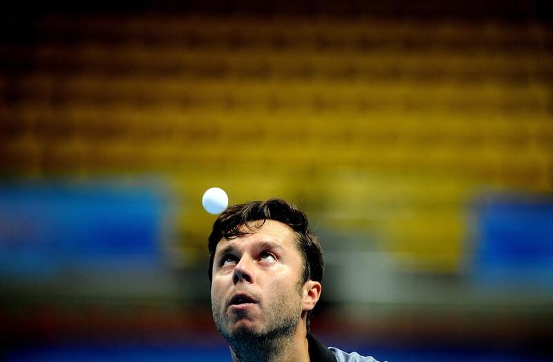 Samsonov Vladimir of Belarus in action during the Men’s singles round of 16 of the 2014 ITTF World Tour Grand Finals at Huamark Indoor Stadium in Bangkok, Thailand. Robertus Pudyanto / Getty