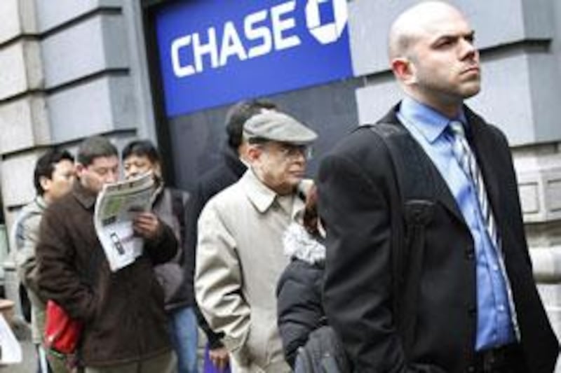 Chasing jobs: people queue to enter the NYCHires Job Fair in New York. Job creation has become the top priority in Washington.