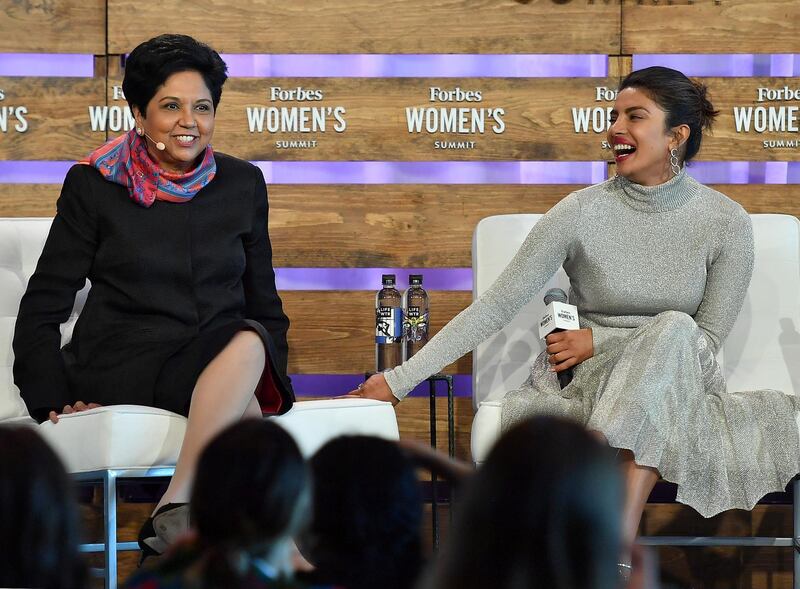 Indra Nooyi, chairman & chief executive officer, PepsiCo and Priyanka Chopra, actress, producer & activist speak onstage at the 2018 Forbes Women's Summit at Chelsea Pier on June 19, 2018 in New York City. (Photo by ANGELA WEISS / AFP)