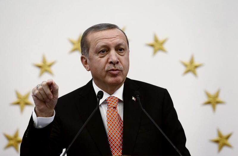Turkish president Recep Tayyip Erdogan said stopping ISIL is his country's 'primary duty'. Yasin Bulbul via AP