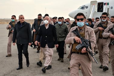 Afghan President Ashraf Ghani arrives with a government delegation during a visit in Herat province on January 21, 2021. AFP