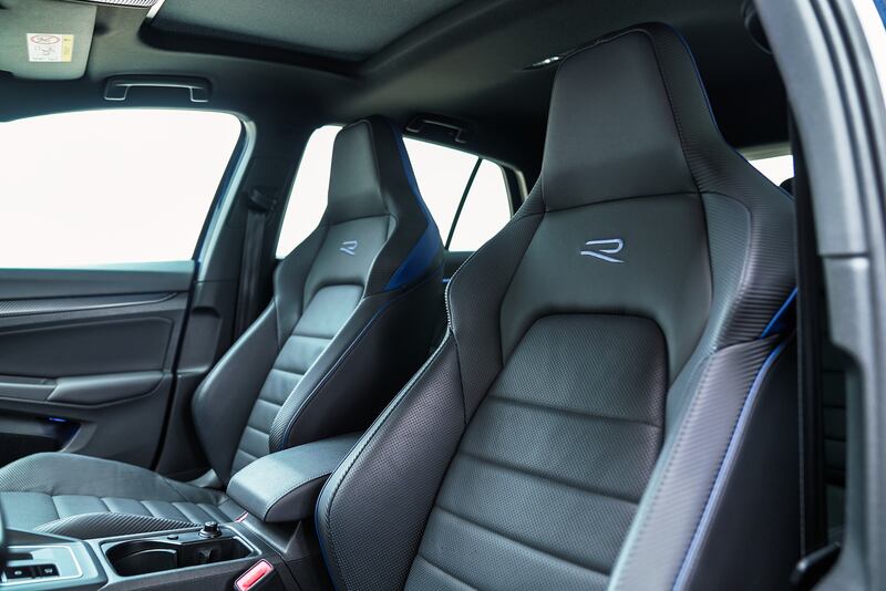 The sporty seats are made in black with blue details.