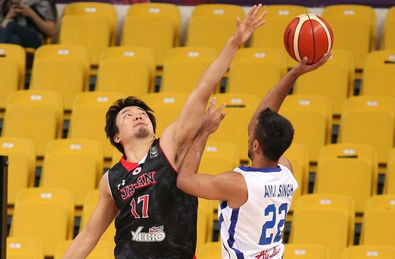 India's Amjyot Singh attempts a shot against Japan during the Fiba Asia Championships in Changsha, China on Friday. AFP Photo / September 25, 2015