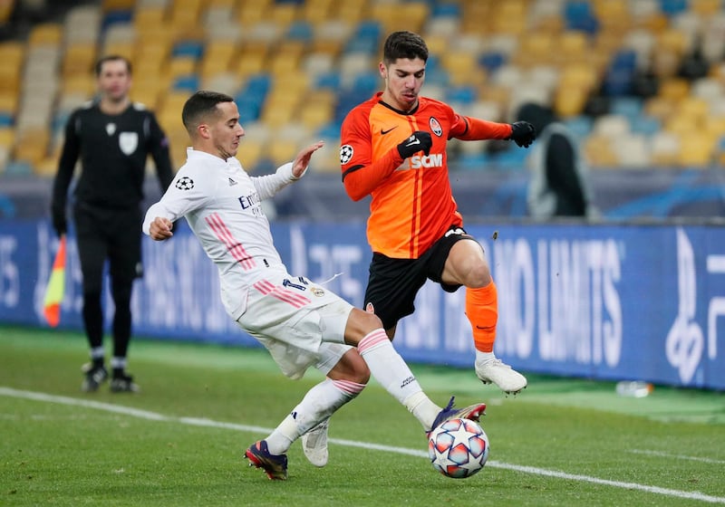 Real Madrid's Lucas Vazquez tackles Shakhtar Donetsk's Manor Soloman. Reuters