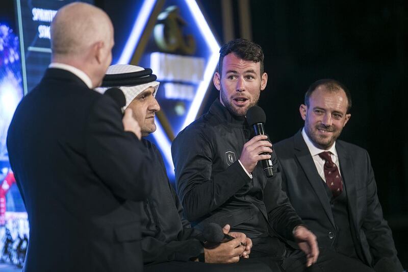 Mark Cavendish, the Abu Dhabi Tour's ambassador, second from right, speaks at the 2017 Abu Dhabi Tour media conference where this year's route and jerseys were unveiled. Mona Al Marzooqi/ The National 
