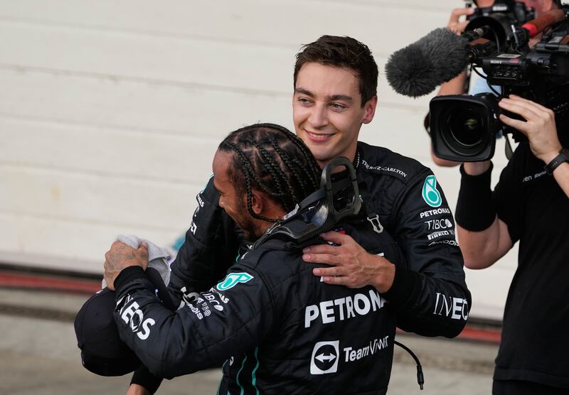 Lewis Hamilton congratulates teammate George Russell for winning the sprint race. AP