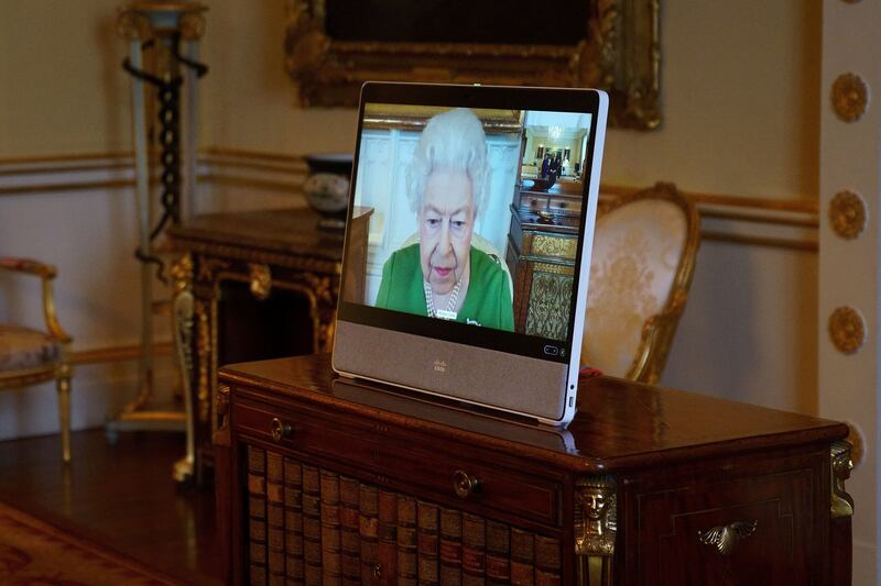 Britain's Queen Elizabeth II appears via video link from Windsor Castle a week after testing positive for Covid-19. Photo: Reuters