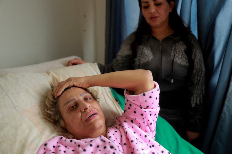 Samar Hamouda, 44, recalls her experience of the earthquake destroying her home, at Tishreen Hospital in Latakia, Syria. Reuters