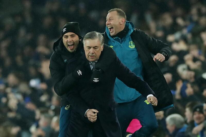 Soccer Football - Premier League - Everton v Burnley - Goodison Park, Liverpool, Britain - December 26, 2019 Everton manager Carlo Ancelotti celebrates their first goal scorted by Everton's Dominic Calvert-Lewin with coach Duncan Ferguson and assistant manager Davide Ancelotti  REUTERS/David Klein  EDITORIAL USE ONLY. No use with unauthorized audio, video, data, fixture lists, club/league logos or "live" services. Online in-match use limited to 75 images, no video emulation. No use in betting, games or single club/league/player publications.  Please contact your account representative for further details.