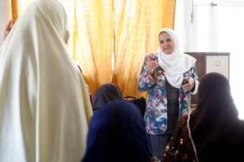 Zakiyyeh Bourini, founder of Jordan Spinster society meets with single women above 30 at Jabal al-Nazeef charitable organization in Amman, Jordan on July 26, 2009. (Salah Malkawi/ The National) *** Local Caption ***  SM002_Spinster.jpg