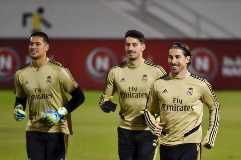 (L to R) Real Madrid's French goalkeeper Alphonse  Areola, Real Madrid's Spanish goalkeeper Diego Altube and Real Madrid's Spanish defender Sergio Ramos attend a training session on the eve of the Spanish Super Cup final between Real Madrid and Atletico Madrid on January 11, 2020, at the King Abdullah Sport City in the Saudi Arabian port city of Jeddah. / AFP / FAYEZ NURELDINE
