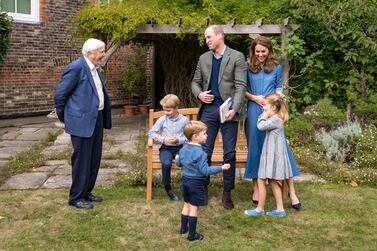 Prince George was presented with the tooth during David Attenborough's Kensingtoin Palace visit. EPA