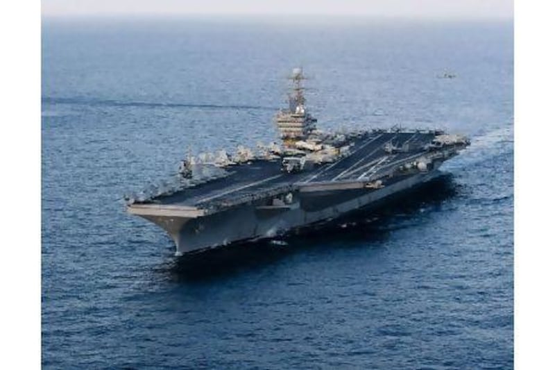 The US naval presence in the Gulf, led by the USS Abraham Lincoln, must not be a spark for war, one reader warns. AFP