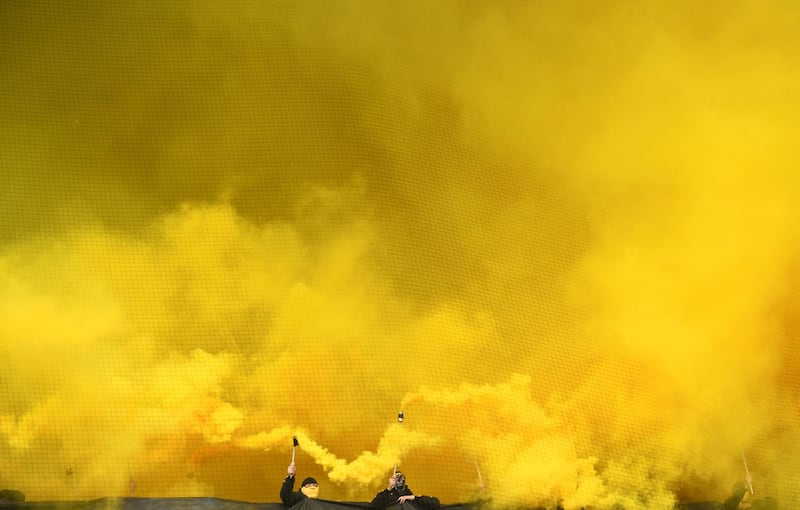 Fans set off smoke bombs inside the stadium before the match between Werder Bremen and Borussia Dortmund at the Weser-Stadion, Bremen, Germany. Reuters