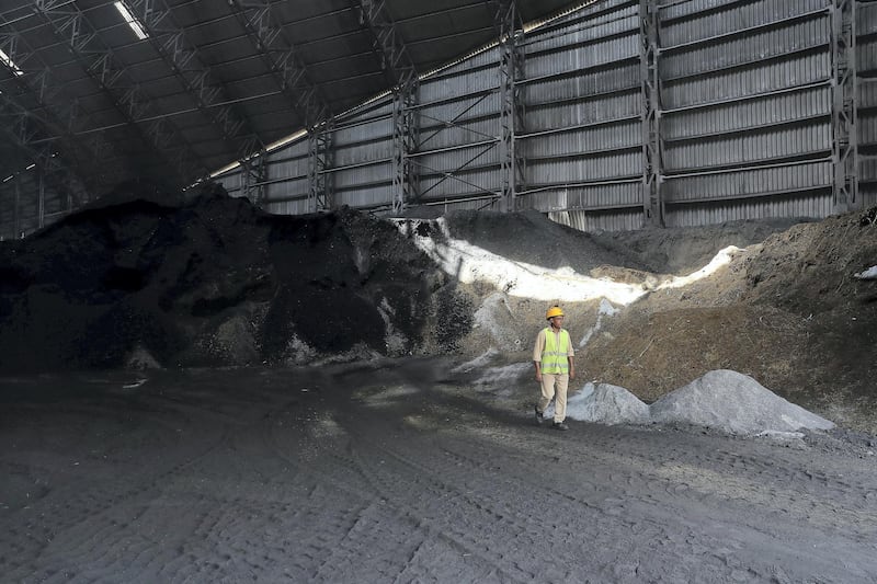 RAK ,  UNITED ARAB EMIRATES , JUNE 20 – 2019 :-  View of the mixture of camel poop with coal to generate energy stored at the Gulf Cement Company in Ras Al Khaimah. Gulf cement factory uses camel poop as a biofuel to generate energy for the production of cement at there plant in RAK. ( Pawan Singh / The National ) For Big Picture/Online/Instagram/News. Story by Anna