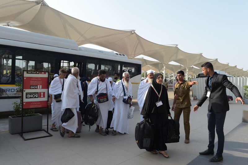 Pilgrims arrive at Sardar Vallabhbhai Patel International Airport in Ahmedabad, India, as they prepare to fly to Saudi Arabia. AFP