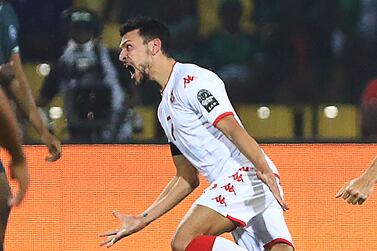 Tunisia's forward Youssef Msakni celebrates   after scoring  the opening goal during the Africa Cup of Nations (CAN) 2021 round of 16 football match between Nigeria and Tunisia at Stade Roumde Adjia in Garoua on January 23, 2022.  (Photo by Daniel BELOUMOU OLOMO  /  AFP)