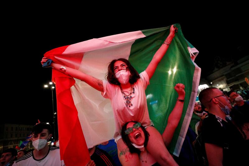 Italy fans celebrate after Ciro Immobile scored their second goal. Reuters