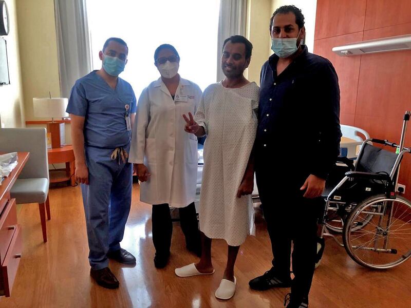 L-R: Dr Hossam Helmy, ICU consultant, Dr Mona Cheetan, neurology consultant, patient Mujeeb and Dr Mohamed Khamis. Staff at Al Zahra Hospital in Dubai cared for Mujeeb for 55 days  Courtesy: Al Zahra  