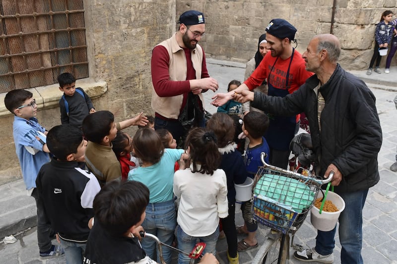 The local non-profit has been feeding Syrians in need during Ramadan for the past decade. AFP