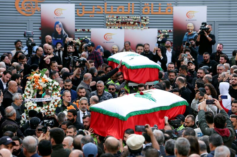 Mourners in Beirut with the coffins of two journalists from Lebanon-based Al Mayadeen TV reportedly killed by an Israeli strike in southern Lebanon on Tuesday. Reuters