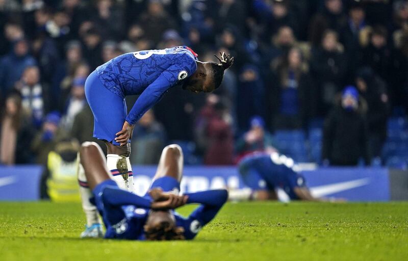 Dejected Chelsea players Michy Batshuayi (C) and Tammy Abraham at the end of the game. EPA