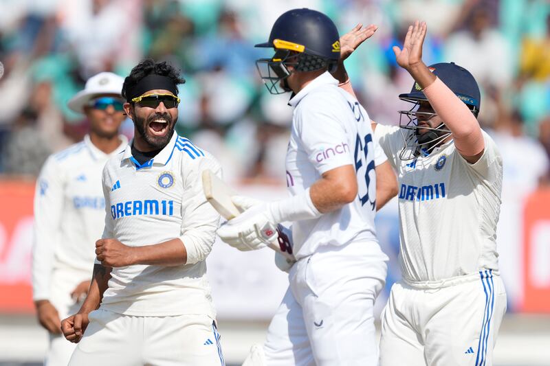 India's Ravindra Jadeja, second left, celebrates the wicket of England's Joe Root, second right on the fourth day of the third cricket test match between England and India in Rajkot, India, Sunday, Feb.  18, 2024.  (AP Photo / Ajit Solanki)