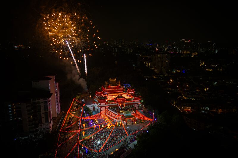 Fireworks fly after a Lunar New Year's Eve countdown celebration at Thean Hou Temple in Kuala Lumpur, Malaysia. Getty Images
