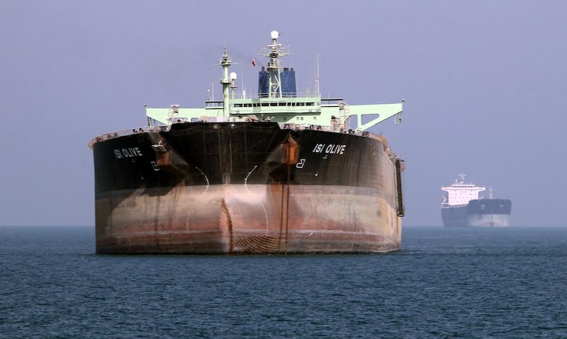 An oil tanker is seen off the port of Bandar Abbas, southern Iran, on July 2, 2012. Iran has come up with several methods to foil the European insurance embargo on ships loaded with its crude, a sanction which may harm its vital exports as much as the EU oil embargo itself. AFP PHOTO/ATTA KENARE (Photo by ATTA KENARE / AFP)