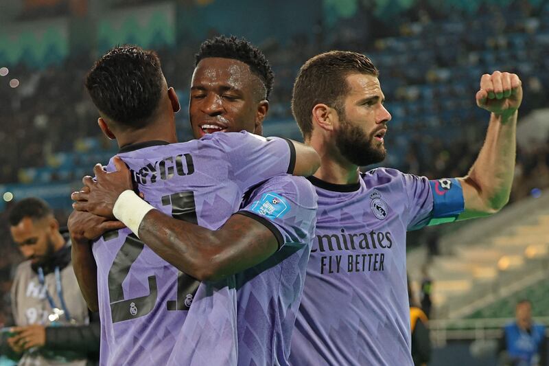 Vinicius Junior celebrates with Rodrygo and Nacho Fernandez. AFP