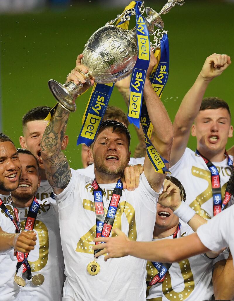 Liam Cooper llifts the trophy. Getty