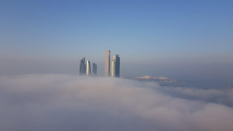 Heavy fog blanketed the UAE capital in December. Photo of Etihad Towers taken from Al Ain Tower in Al Khalidiyah, Abu Dhabi. Erica ElKhershi / The National