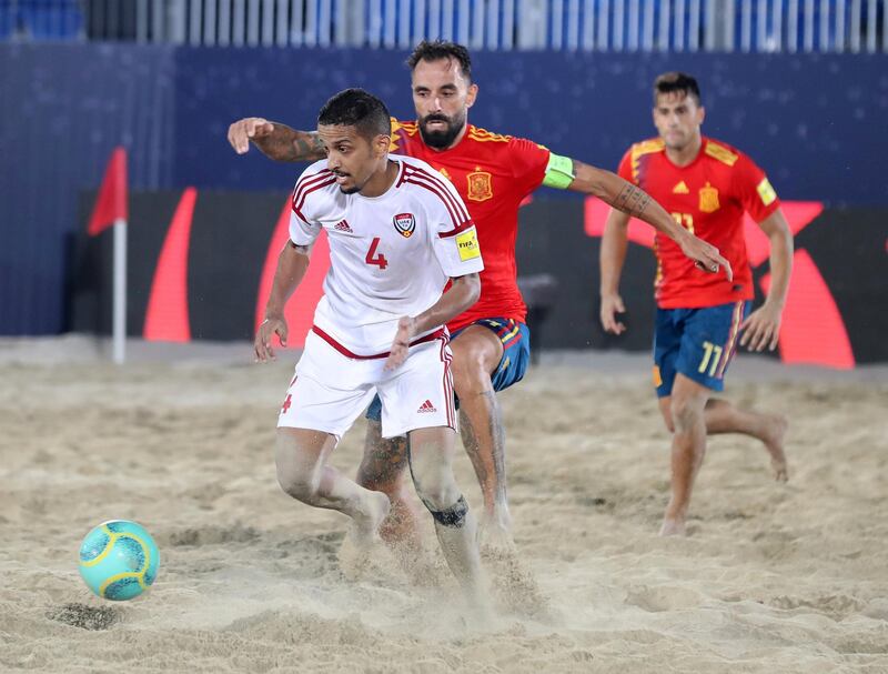 Dubai, United Arab Emirates - November 05, 2019: The UAE's Waleed Beshr beats his opponent during the game between the UAE and Spain during the Intercontinental Beach Soccer Cup. Tuesday the 5th of November 2019. Kite Beach, Dubai. Chris Whiteoak / The National