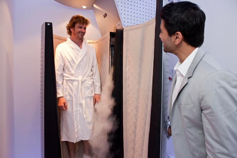DUBAI, UNITED ARAB EMIRATES,  JULY 07, 2013. Journalist Neil Vorano tries out the newly launched Cryo full body treatment at the Cryo Health Spa Dubai, located in the Emirates Towers Boulevard. Taking him through the treatment is Benny Parihar, Partner of Cryo Health. (ANTONIE ROBERTSON / The National) Journalist Neil Vorano