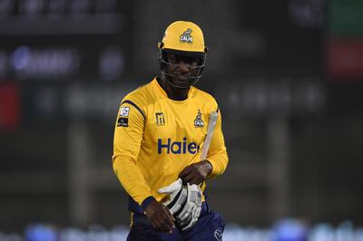 Darren Sammy of Peshawar Zalmi walks back to the pavilion after his dismissal by Shadab Khan of Islamabad United during the Pakistan Super League final match between Peshawar Zalmi and Islamabad United at the National Cricket Stadium in Karachi on March 25, 2018.

Thousands of security personnel are being deployed as Karachi hosts the final of the Pakistan Super League, its biggest cricket match in nine years, after a spate of attacks drove away foreign teams. / AFP PHOTO / ASIF HASSAN