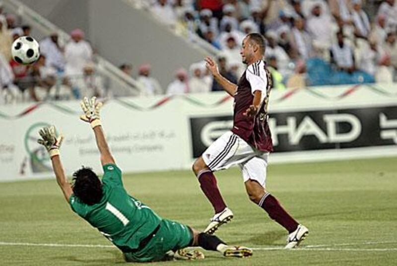 Fernando Baiano, right, scored the goals to help guide Al Wahda to the league title.
